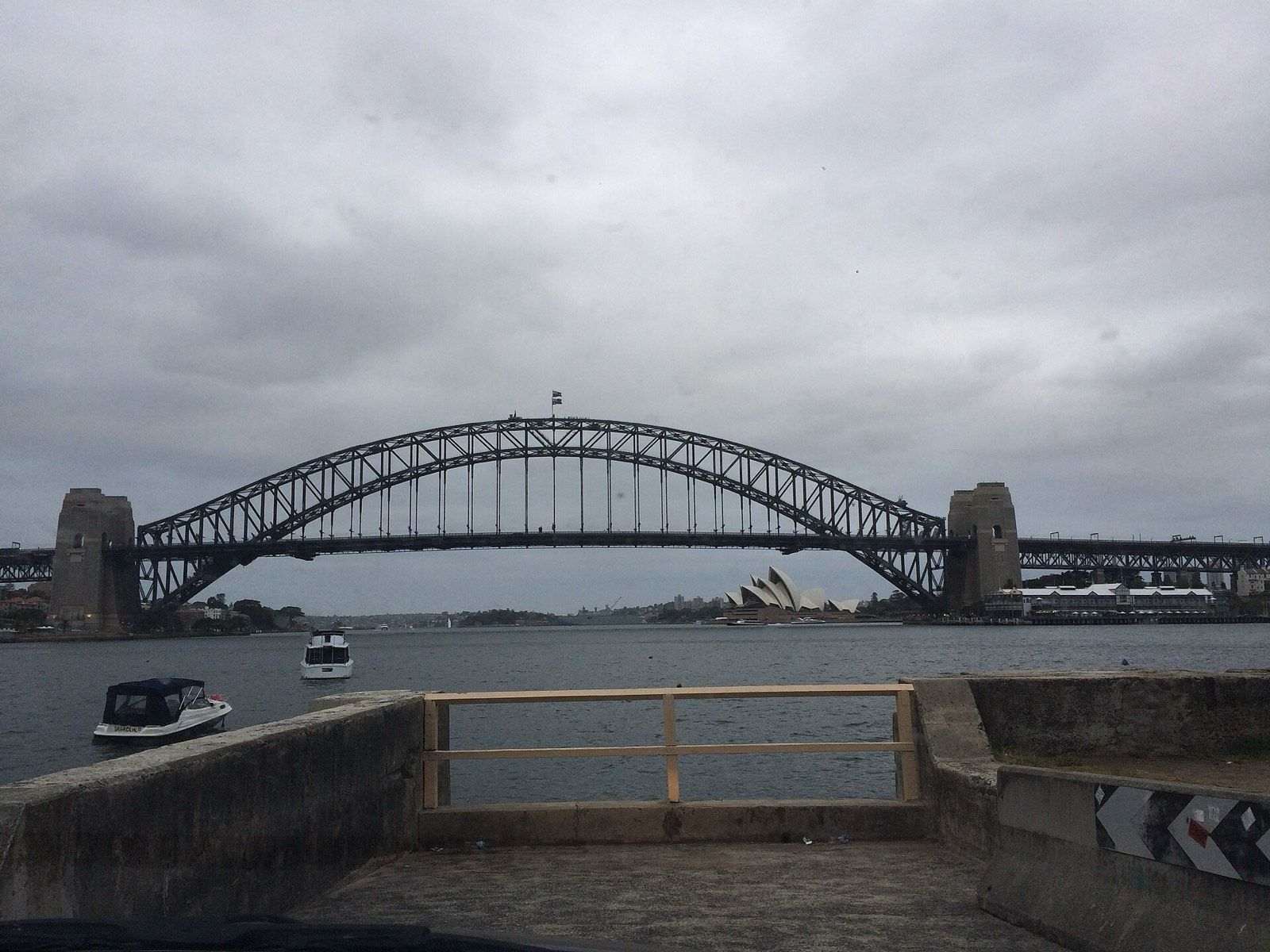The Harbour Bridge from Blues Point Reserve, the Opera House visible beneath its deck